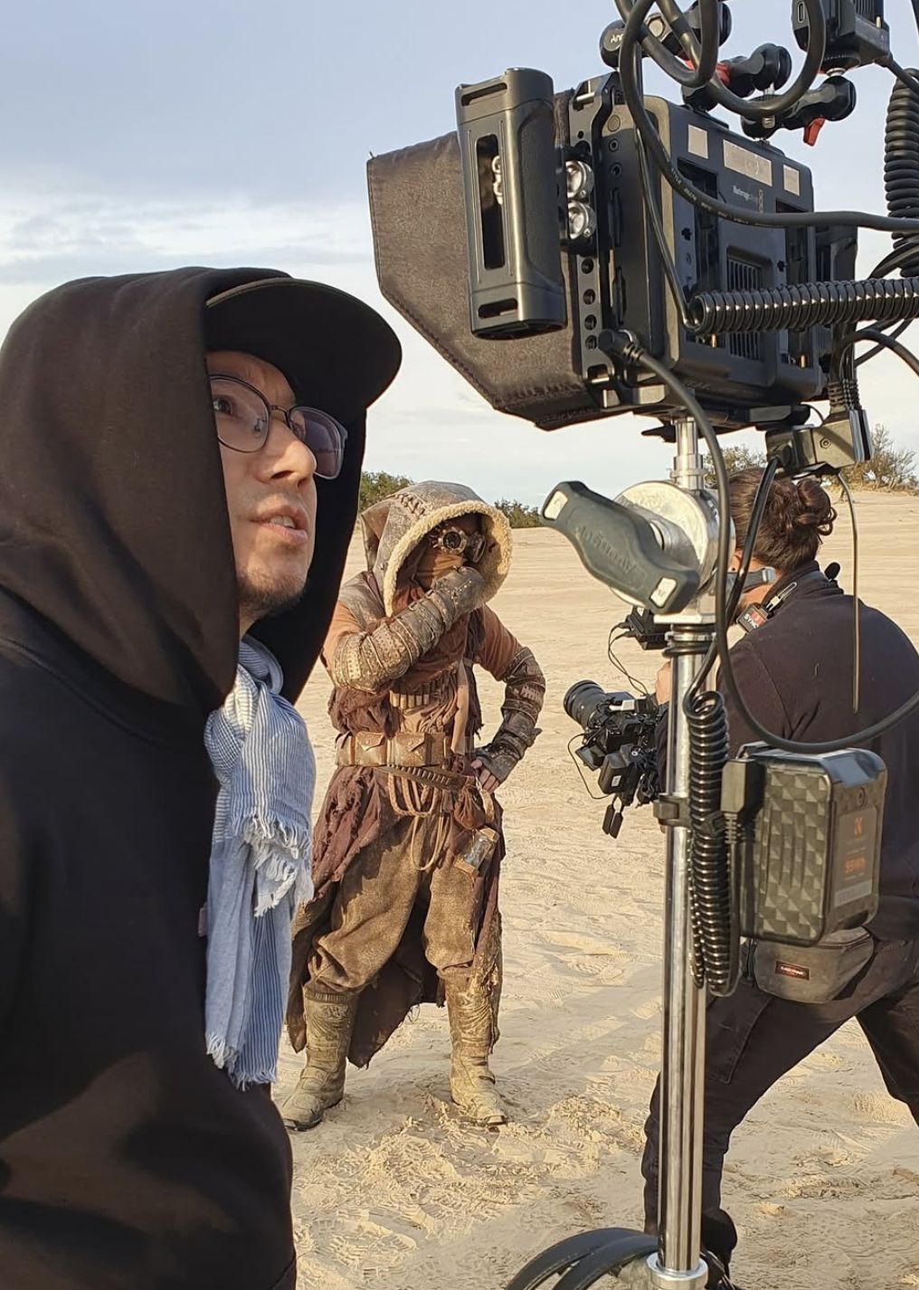 Behind the scenes: The same costume on set in the dunes